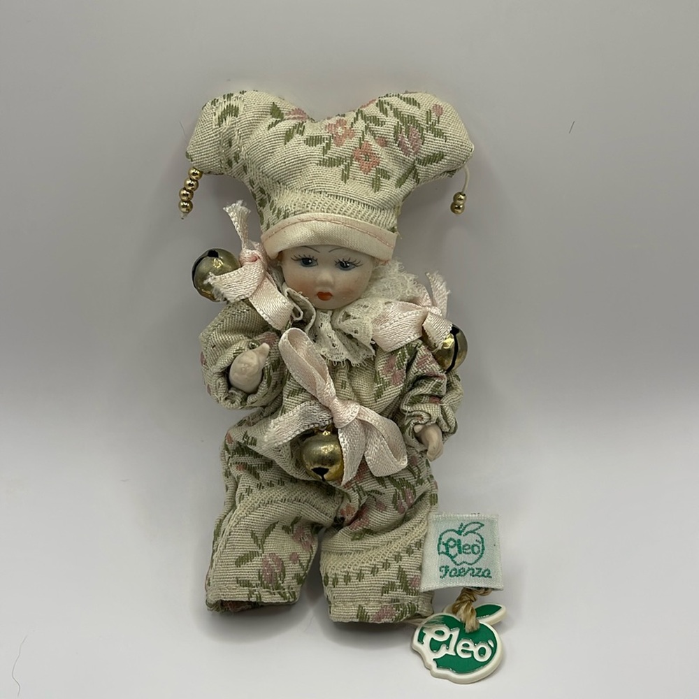 This doll by Cleo is new with tags. It is approximately 4” tall and 2” wide.